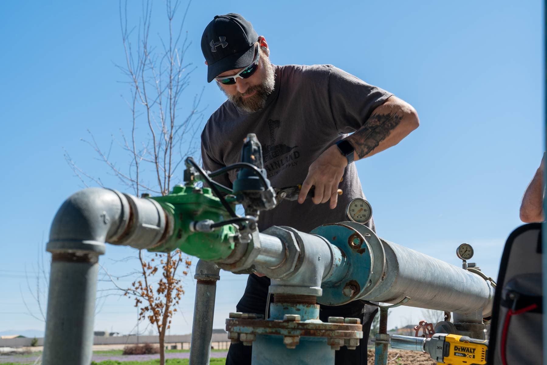 Technician working on a pump system.